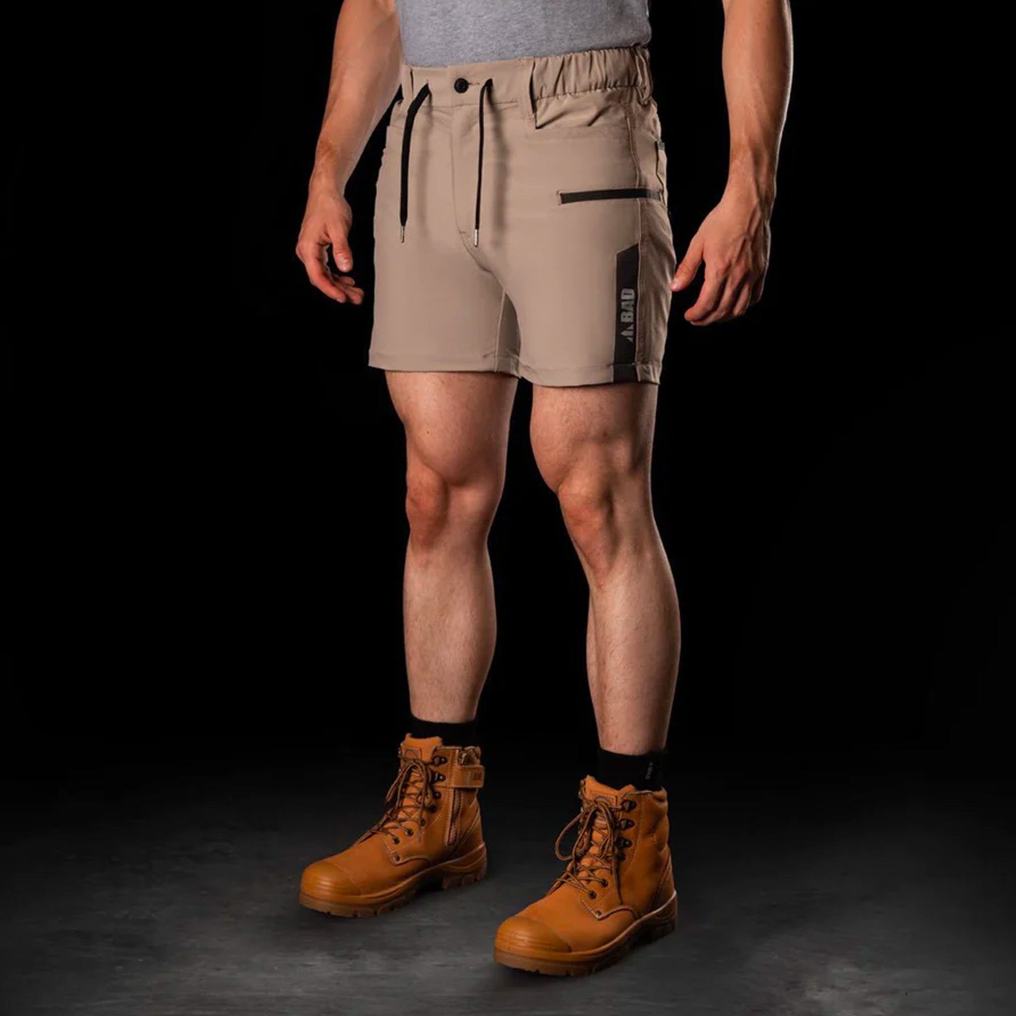 bad next waterproof elastic waist short shorts in khaki