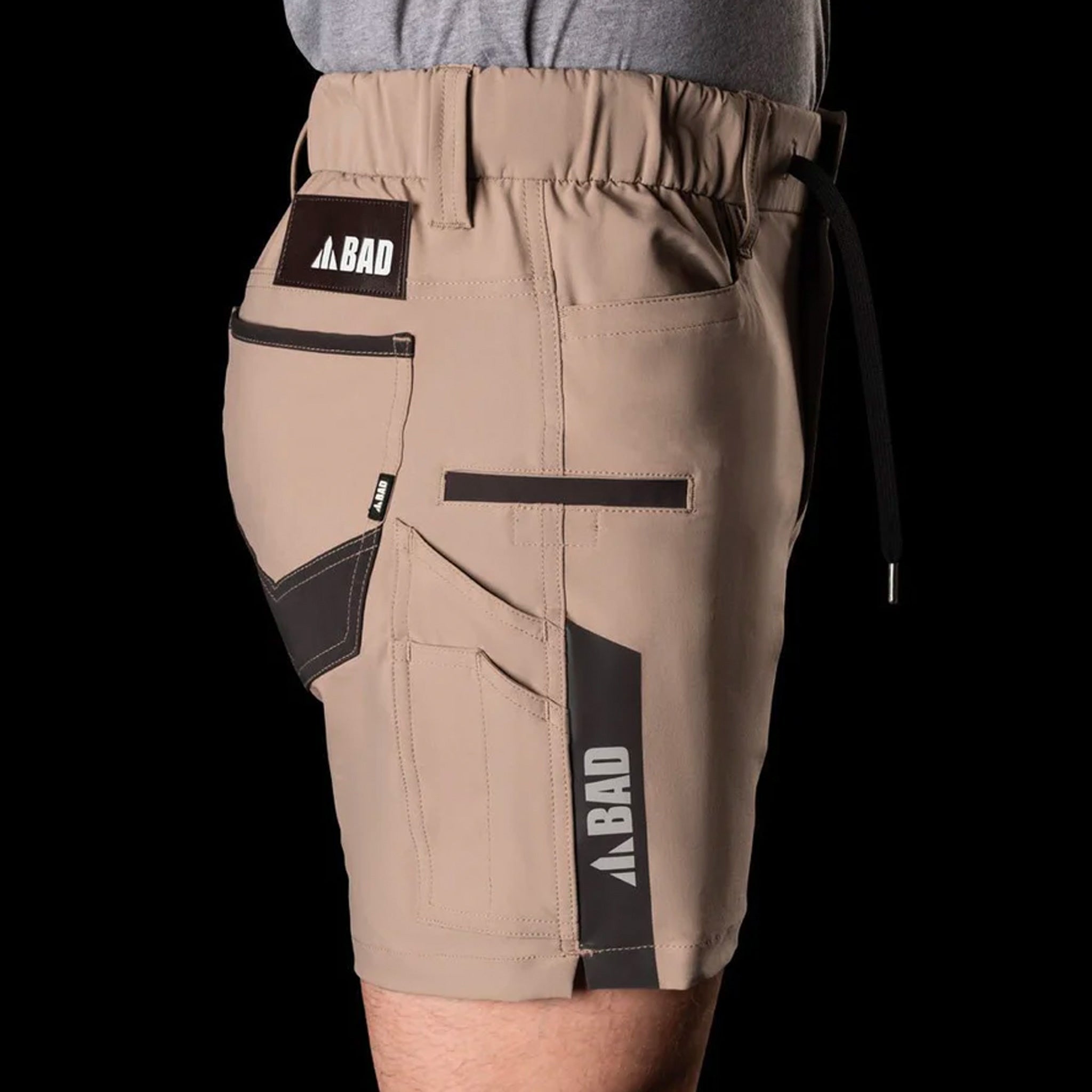 bad next waterproof elastic waist short shorts in khaki